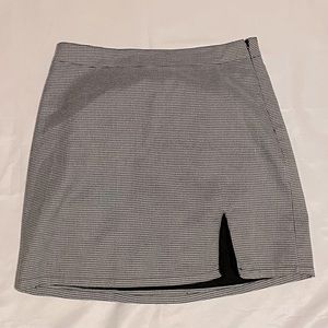 Black and white mid thigh skirt.